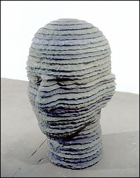 Boaz Vaadia Tai (2003), a unique bluestone figurative sculpture featuring a stacked stone portrait head, measuring 53 x 33 x 42 inches. This monumental stone artwork merges ancient sculptural traditions with modern abstraction, available at Sponder Galler