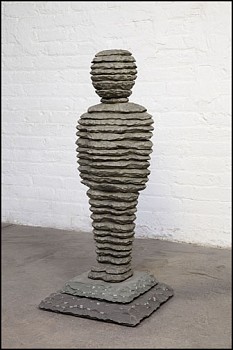 Boaz Vaadia Milka (#121) (2013), bronze and bluestone sculpture, 35 x 16 x 16 inches. A stacked, abstracted human form, reflecting Vaadiaâ€™s use of natural materials and stratified layering, inspired by archaeological and environmental influences.
