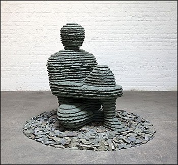 Boaz Vaadia Nahor (#141) (2016), bronze and bluestone sculpture, 43 x 56 x 56 inches. A seated figure composed of stacked stone layers, reflecting Vaadiaâ€™s exploration of nature, human form, and ancient stone structures.