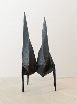 A limited-edition bronze sculpture by Lynn Chadwick titled Conjunction XI (1967), featuring an abstract, geometric form with twin spire-like peaks and elongated legs. This modernist bronze artwork is part of an edition of 4/4 and is ideal for collectors,