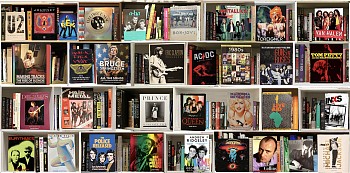 Photographic artwork titled Rock 80â€™s WHT (2024) by Max-Steven Grossman, a diasec-mounted fine art print (Edition 1/5, 37 x 75 in.), featuring a hyperreal bookshelf composition with books on 1980s rock legends, pop icons, and music history.