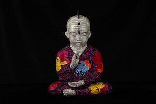 Metis Atash, Bloom and Beyond, 2025
Resin, acrylic paint and 28,000 Swarovski crystals, 17 x 12 x 7 in.
A cast resin Punk Buddha sculpture with imagery inspired by Andy Warol's Flowers series created using over 28,000 swarovski crystals 
ATAS00261