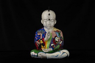 Metis Atash, She Who Dreams, 2025
Resin, acrylic paint and 28,000 Swarovski crystals, 17 x 12 x 7 in.
A cast resin Punk Buddha sculpture with imagery inspired by Pablo Picasso created using over 28,000 swarovski crystals 
ATAS00263